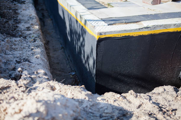 Professional Waterproofing technician working in Williamston, SC